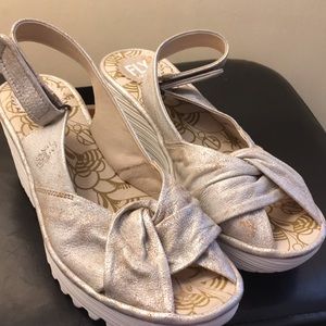 FLY London Yakin white metallic gold distressed wedge sling back.